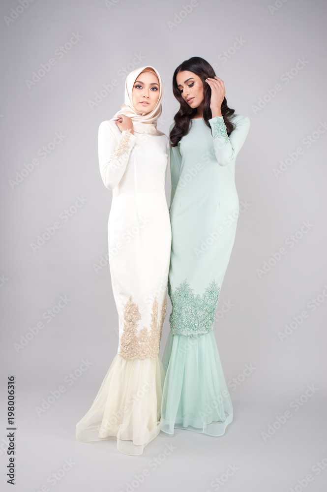 Beautiful Eid Mubarak fashion for ladies.Portraiture of female models with traditional dress and hijab. Beautiful Eid Mubarak fashion for ladies.Portraiture of female models with traditional dress and hijab.