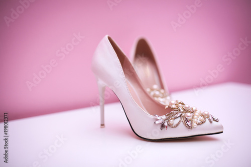 Elegant and stylish bridal shoes. Selective focus.