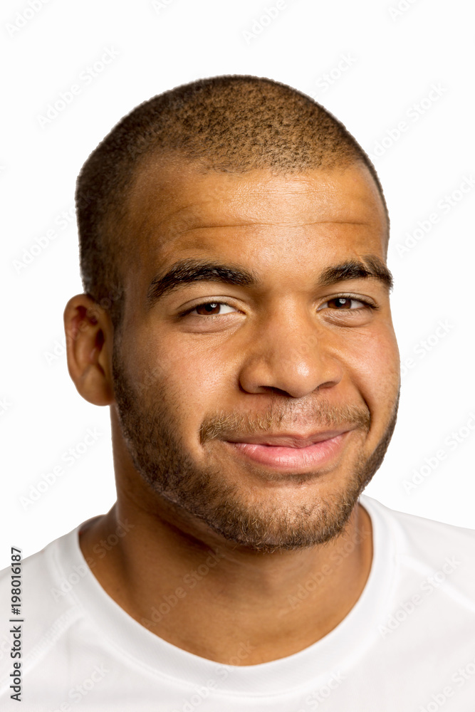 Obraz premium Handsome African man laughing, close-up
