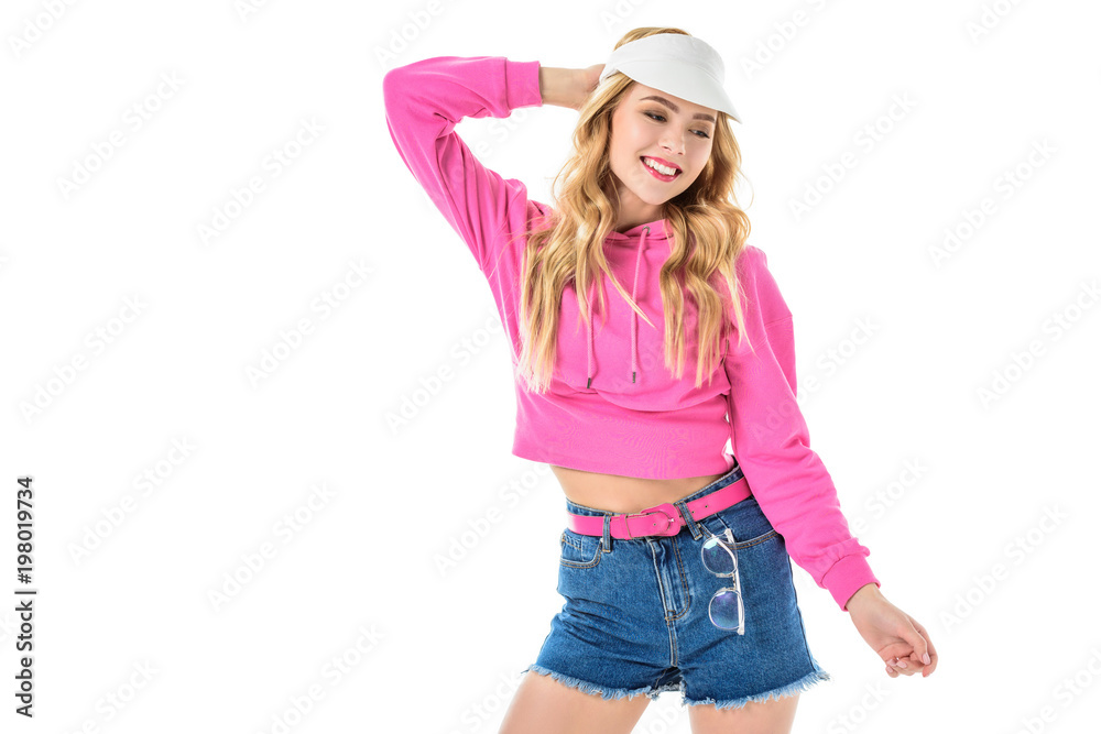 Blonde woman in pink clothes posing isolated on white Blonde woman in pink clothes posing isolated on white