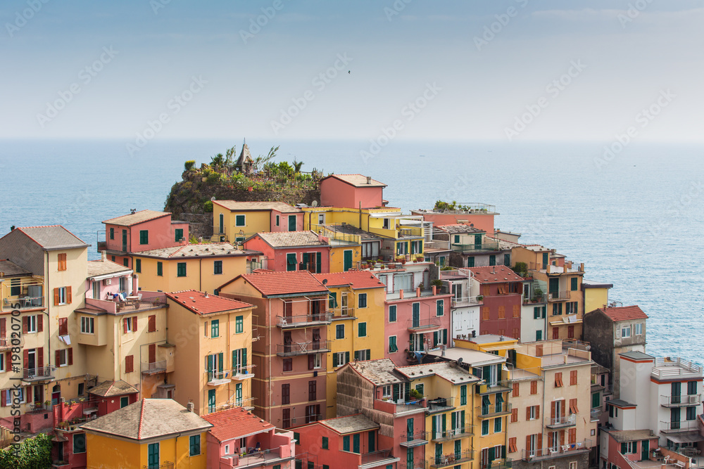 Manarola town, one of five famous colorful villages of Cinque Terre in Italy.