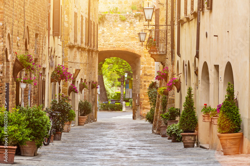 Colorful old street in Pienza, Tuscany, Italy