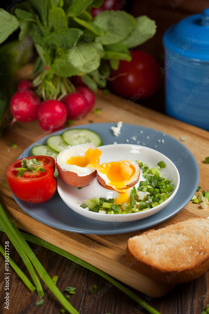 Boiled egg with crunchy bread and healthy vegetables for breakfast Boiled egg with crunchy bread and healthy vegetables for breakfast