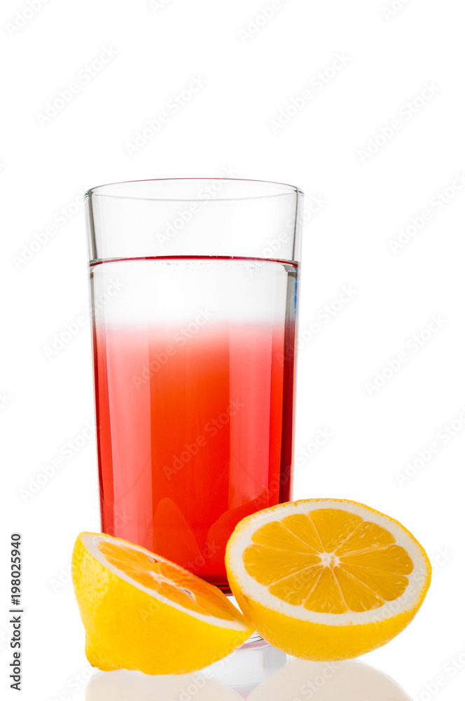 Fresh juice and sliced lemon on white background Fresh juice and sliced lemon on white background