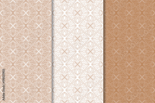 Brown and white geometric ornaments. Set of seamless patterns © Liudmyla