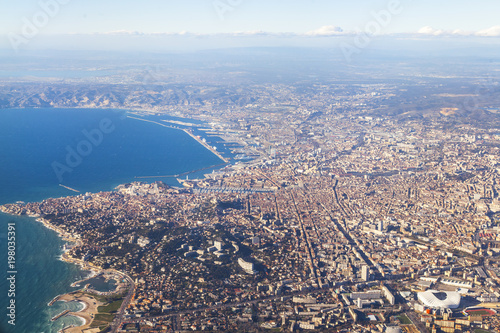 MARSEILLE, FRANCE, on March 2, 2018. The panorama of the city is visible from a window of the plane coming in the land at the airport