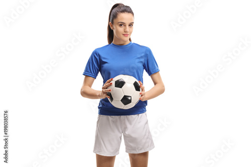 Female soccer player holding a football © Ljupco Smokovski