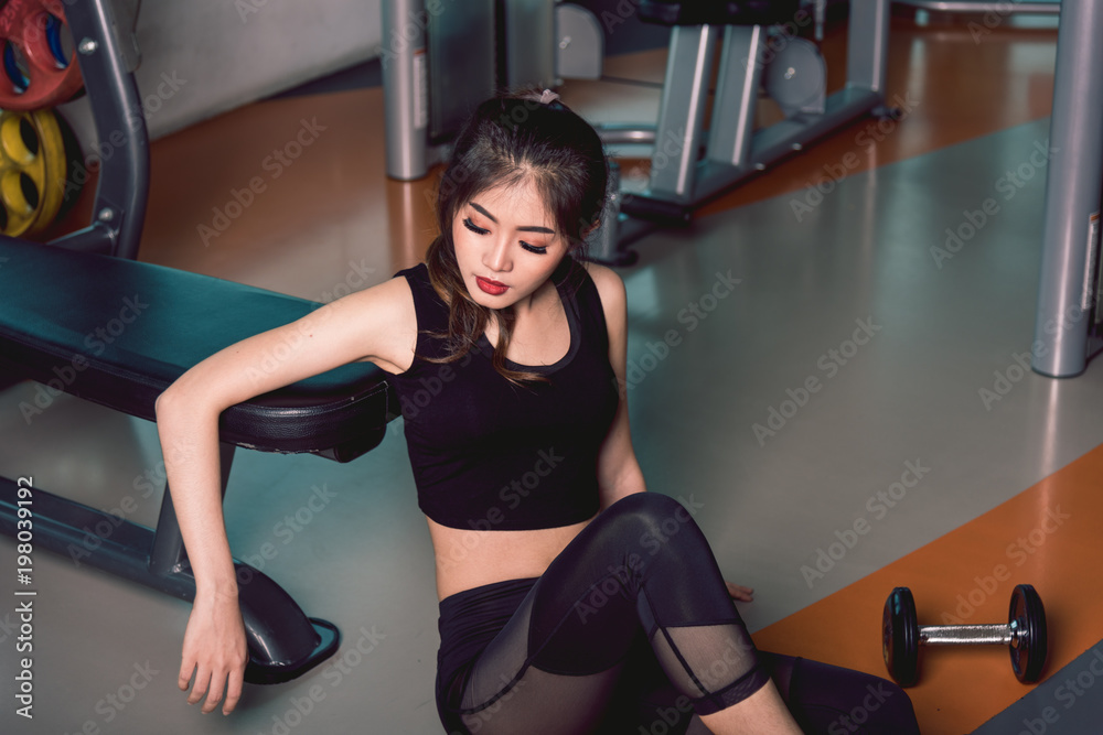 Fitness beautiful young woman on GYM Fitness beautiful young woman on GYM