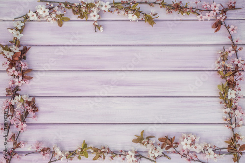 Spring pink purple wooden background with blossom