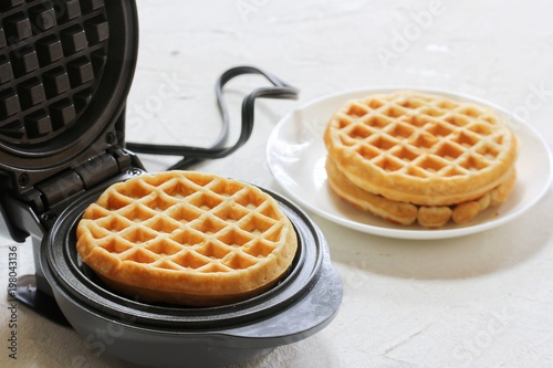 Homemade Mini waffles on Waffle Maker, selective focus