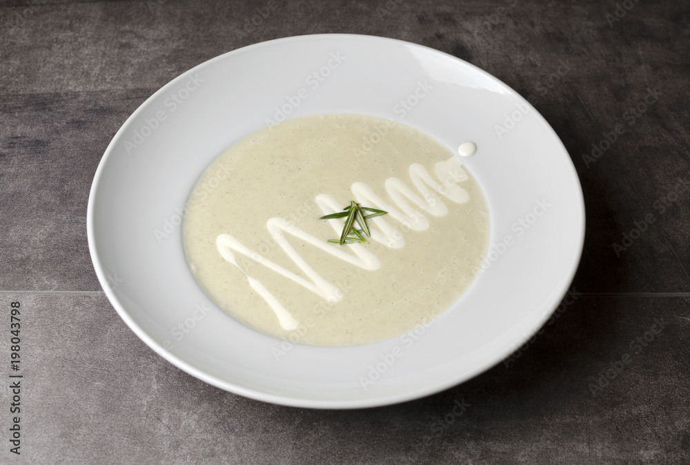Cream of mushroom soup on a white plate
Cream of mushroom soup on a white plate