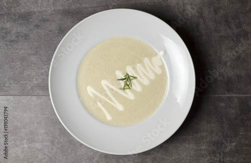 Cream of mushroom soup on a white plate 