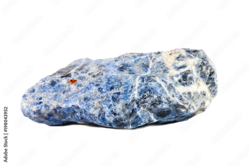 Macro shooting of natural gemstone. Raw mineral sodalite, South Africa. Isolated object on a white background. Macro shooting of natural gemstone. Raw mineral sodalite, South Africa. Isolated object on a white background.