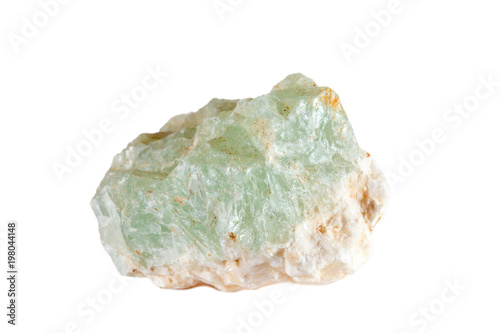 Macro shooting of natural gemstone. The raw mineral is prehnite. Isolated object on a white background.