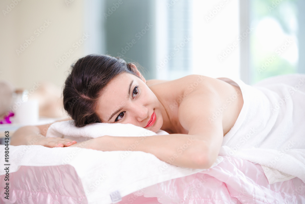 Beautiful young woman relaxing spa salon white light background,Spa concept Beautiful young woman relaxing spa salon white light background,Spa concept