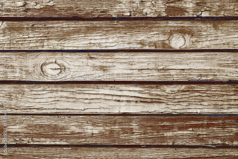 Brown wooden desk. Dry peeling paint natural weathered backdrop.