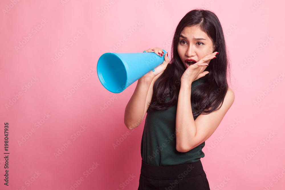 Beautiful young Asian woman announce with megaphone. Beautiful young Asian woman announce with megaphone.