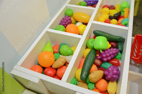 Group of vegetable and fruit plastic toys for children