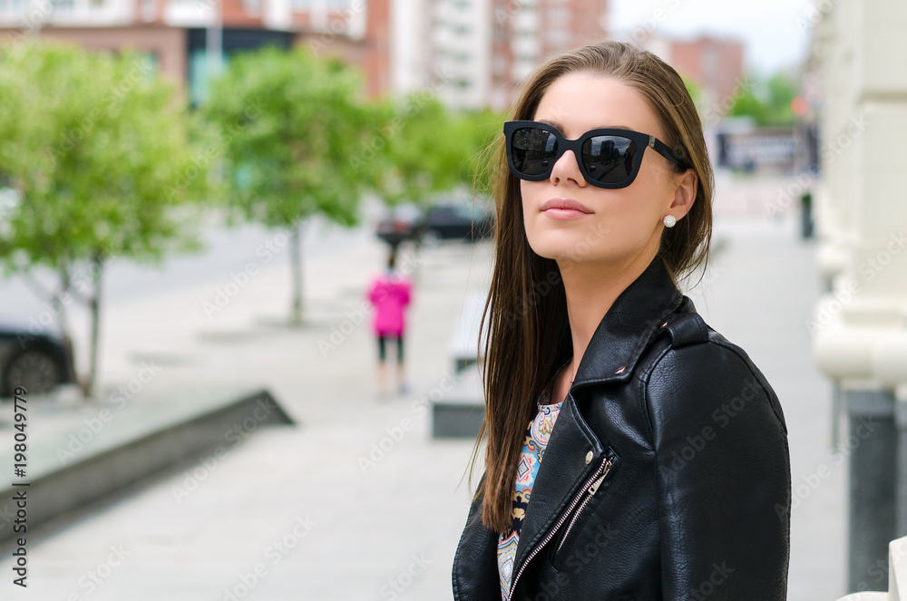 beautiful girl with sunglasses on the street