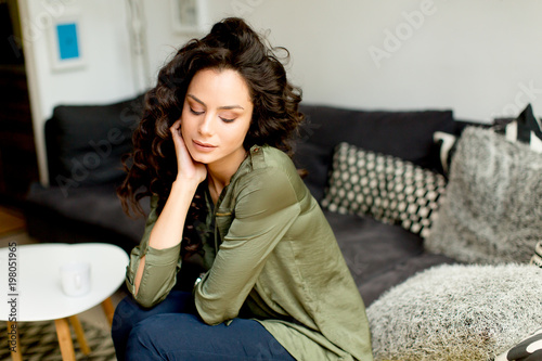 Portrait of a young woman w...