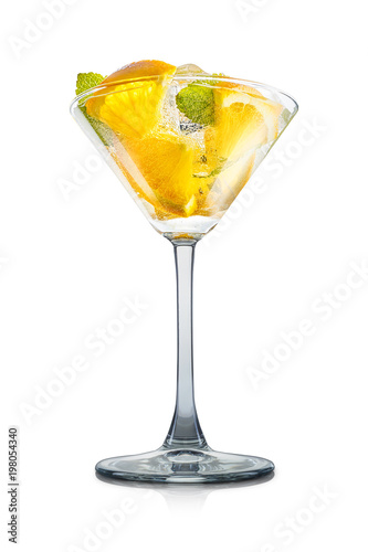 Mojito cocktail in martini glass with mint, orange and ice cubes on white background. Clipping path