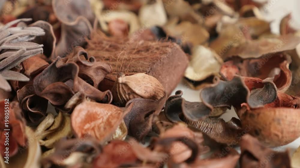Shallow DOF potpourri fragrant flowers close-up slow tilt footage - Mixture of dried petals and spices Shallow DOF potpourri fragrant flowers close-up slow tilt footage - Mixture of dried petals and spices