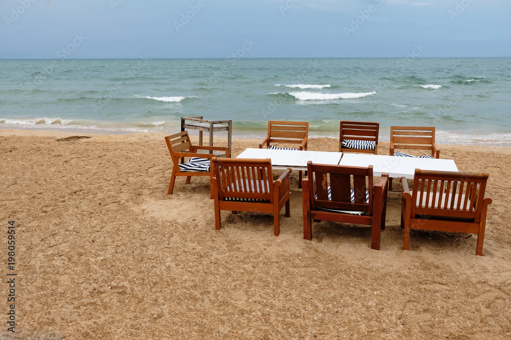 Dinner table set on the beach