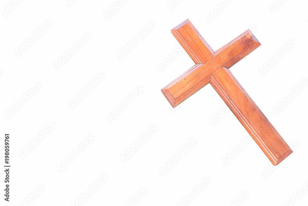 The wooden cross isolated on a white background.