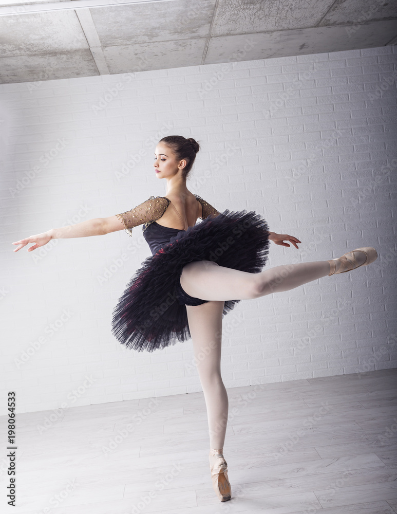 Young beautiful ballet dancer practice to make pirouette Photos | Adobe  Stock
