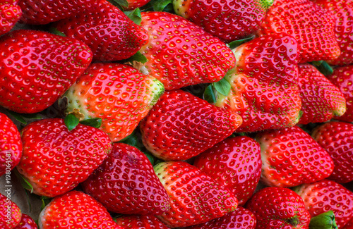 A full box of organic strawberries.
