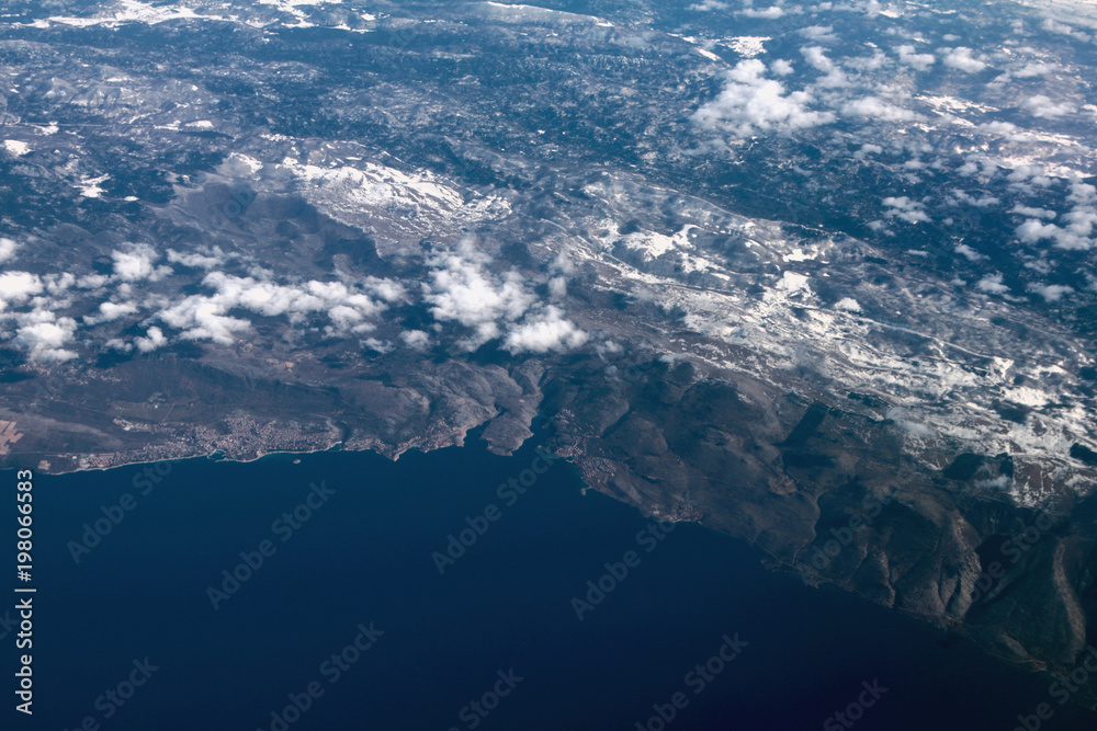 Adriatic Sea and coast with snow-covered mountains, aerial photograph. Novi-Vinodolski, Povile, Klenovica, Croatia