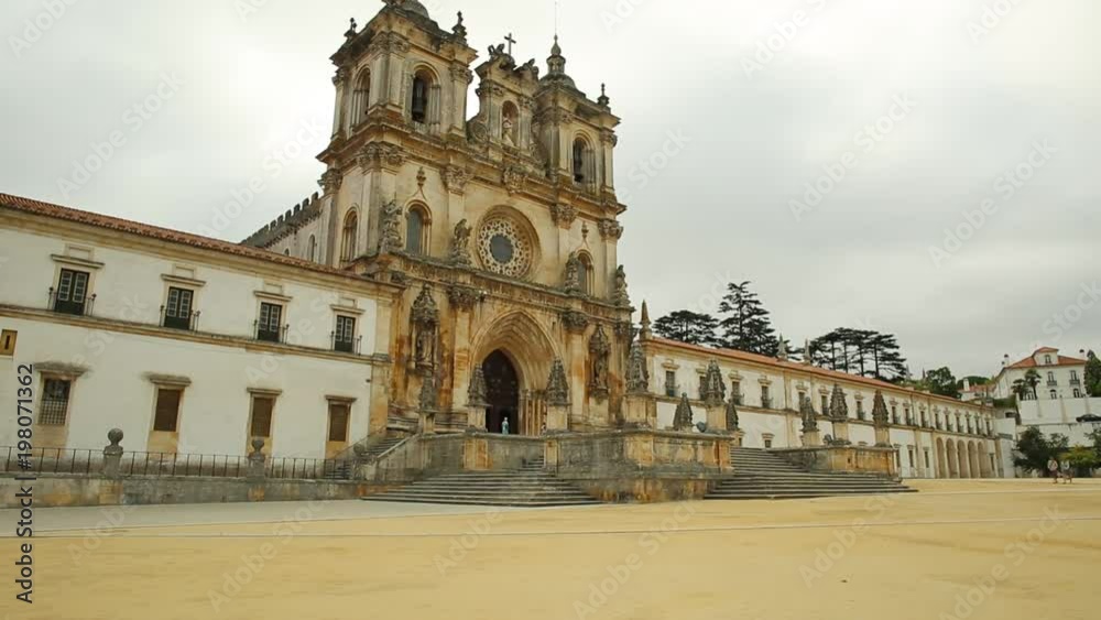 Perspective view of Roman Gothic Monastery of Alcobaca or Mosteiro de Santa Maria de Alcobaca, UNESCO Heritage, Alcobaca city.The church and abbey were the first Gothic building in Portugal. Perspective view of Roman Gothic Monastery of Alcobaca or Mosteiro de Santa Maria de Alcobaca, UNESCO Heritage, Alcobaca city.The church and abbey were the first Gothic building in Portugal.