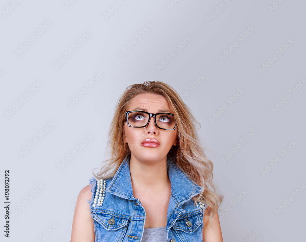 Pretty woman in glasses feeling anxious