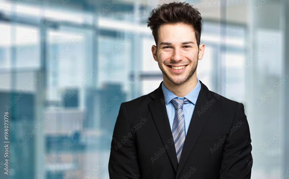 Young businessman in his office