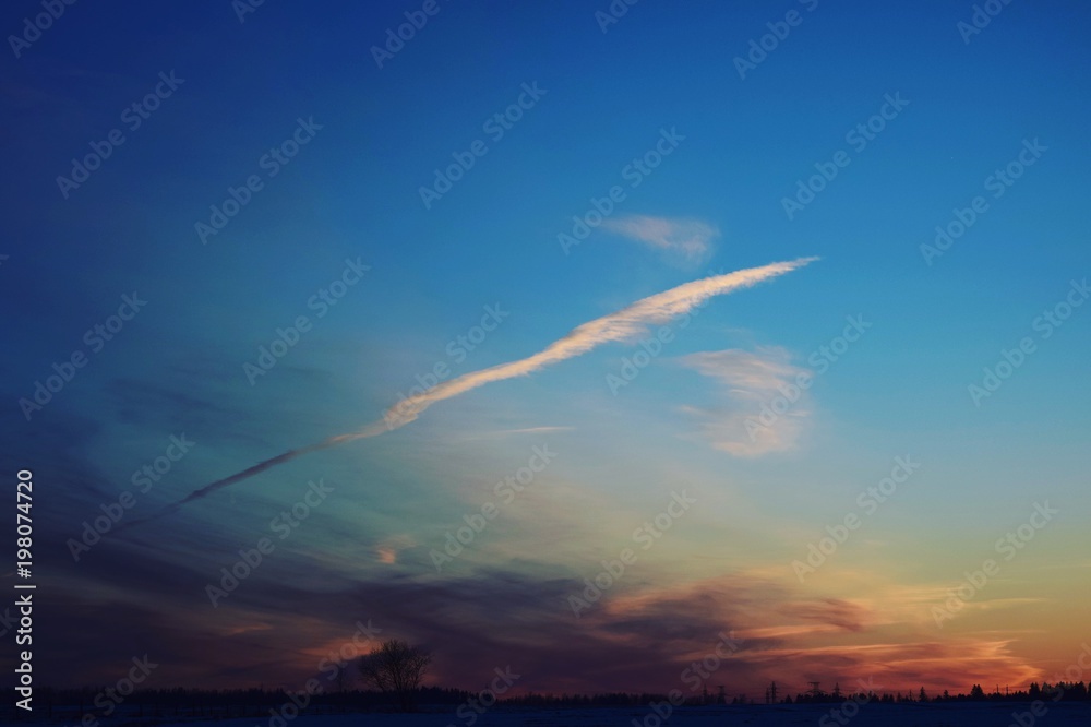 Beautiful cloud against the background of the evening sky with a sunset