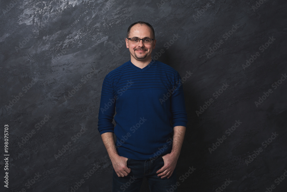 Handsome confident man in glasses portrait