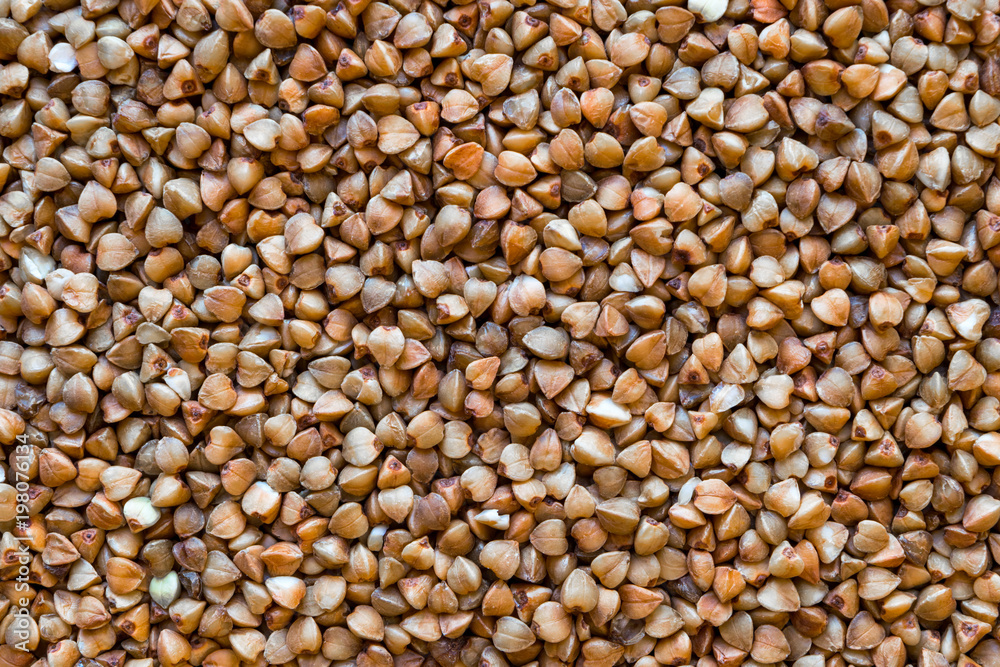 Brown and Close up Buckwheat Grains Background Brown and Close up Buckwheat Grains Background