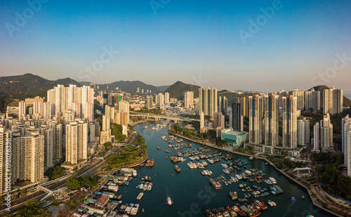 Aerial Top View of The Aberdeen Bay and Skyscrapers on two sides of the harbour in Southern District,Hong Kong. © kingrobert