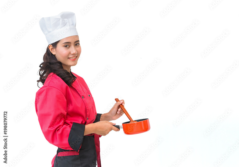 Smiling chef woman in red uniform holding cooking utensils Smiling chef woman in red uniform holding cooking utensils