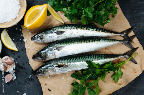 Fresh mackerel fish with ingredients to cook