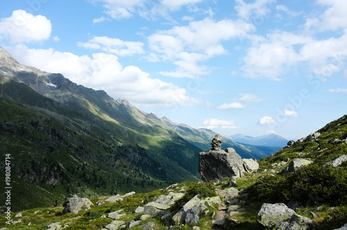 Stone figure in a mountain panorama in Carinthia, Austria