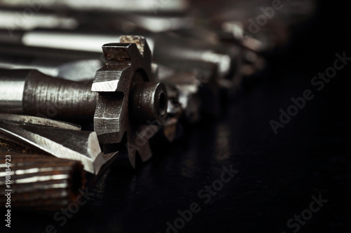 Metal mechanical parts on a black background.