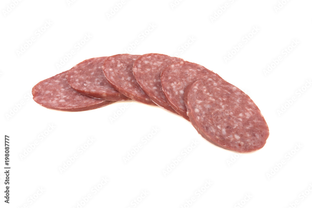 sausage sliced in thin slices isolated on white background
