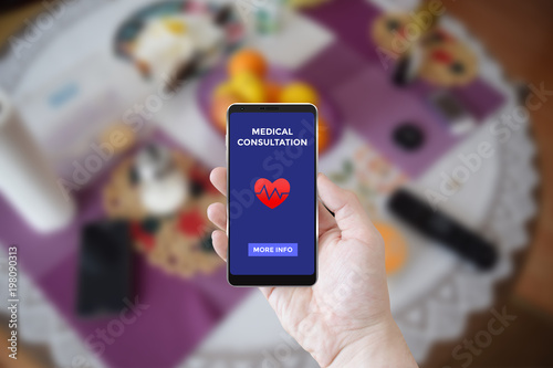 Man using smartphone app with responsive screen mock up