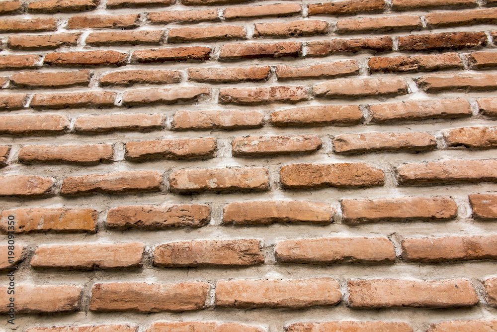 brick wall with a large layer of mortar