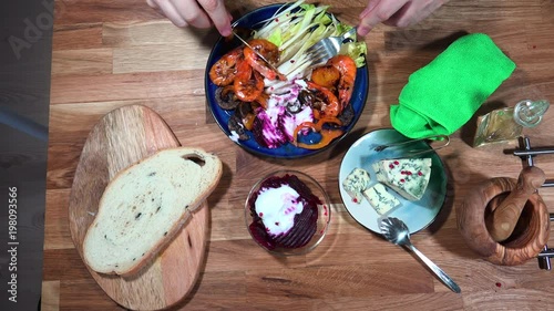 Top view prepare serving plate with shrimps, andive, beet salad and moldy cheese. photo