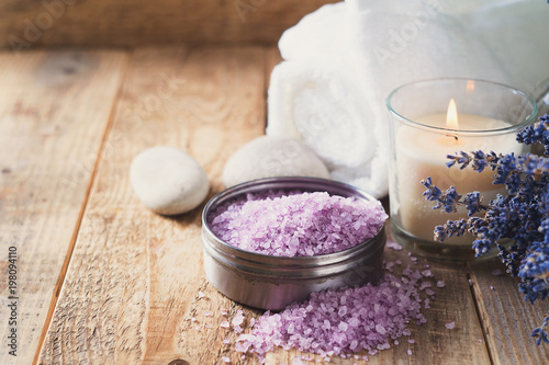 Lavander salt with natural spa products and decor for bath