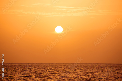 Setting sun on pacific ocean. Beautiful sunset, sunrise sea horizon