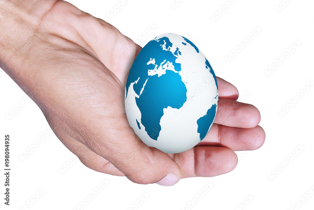 Easter egg in hand / Easter egg with drawing of the card of the planet Land in hand of the person Easter egg in hand / Easter egg with drawing of the card of the planet Land in hand of the person