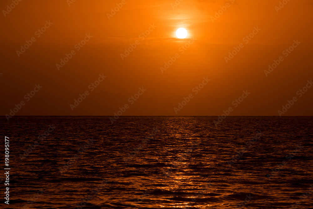 Setting sun on pacific ocean. Beautiful sunset, sunrise sea horizon